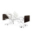 White hospital bed with various attachments on a white background Medacure DLX600-CLS Bariatric Full-Electric Bed