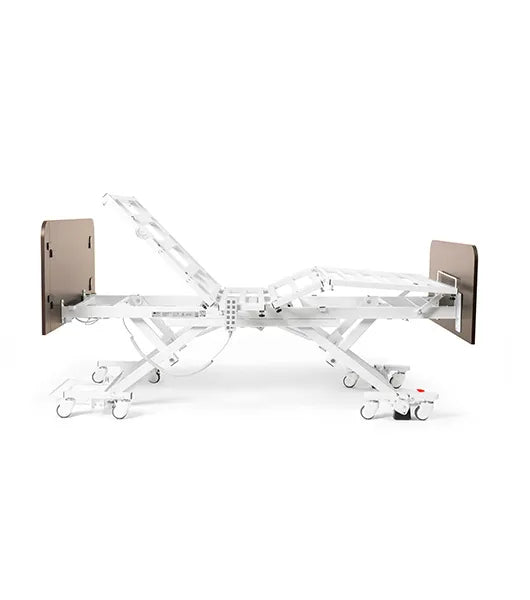 Hospital bed with adjustable head and foot sections on a white background Medacure DLX600-CLS Bariatric Full-Electric Bed