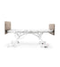 Wall-mounted medicalbarriatric bed table on a white background Medacure DLX600-CLS Bariatric Full-Electric Bed
