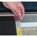 Close-up of PVI bariatric threshold ramp with screw placement hole for securing the ramp at a doorway