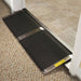 PVI bariatric threshold ramp installed at an interior doorway with slip-resistant black surface