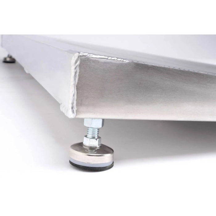 Close-up of PVI elev8 adjustable threshold ramp support leg showing adjustable height foot underneath the aluminum ramp