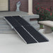 PVI multifold ramp installed over front steps with black traction surface for wheelchair or scooter access