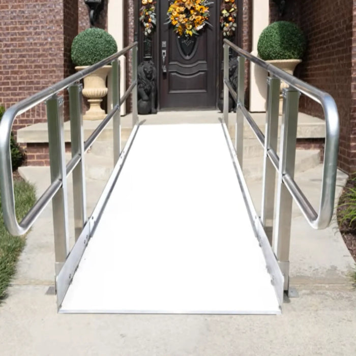 PVI OnTrac ramp installed at front door with handrails providing safe wheelchair access over entry steps