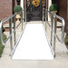 PVI OnTrac ramp installed at front door with handrails providing safe wheelchair access over entry steps