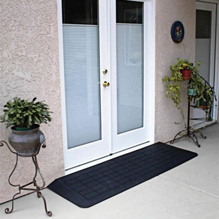 PVI rubber threshold ramp installed at patio doors to help bridge a small exterior entry threshold