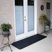 PVI rubber threshold ramp installed at patio doors to help bridge a small exterior entry threshold