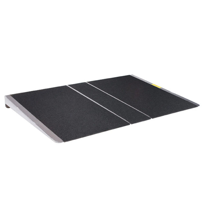 PVI self-supporting threshold ramp with black slip-resistant surface for doorway access
