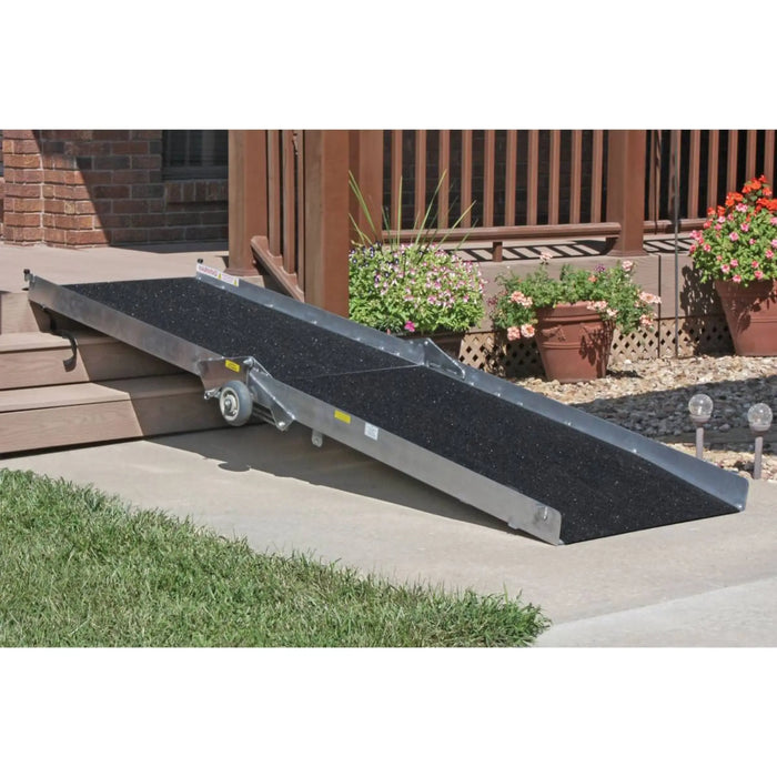 PVI Wheel-A-Bout ramp set up over outdoor steps providing a stable access path for wheelchair or scooter