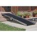 PVI Wheel-A-Bout ramp set up over outdoor steps providing a stable access path for wheelchair or scooter