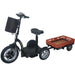 Black RMB Multi-Point QR Quick-Release Folding Mobility Scooter with optional Multi-Tote Trailer, shown in front left view with front storage bag
