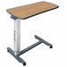 StarSleep Motion Bed-Side Table featuring a woodgrain tabletop, height-adjustable frame, and lockable caster wheels designed for bedside dining, reading, laptop use, and everyday convenience.