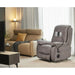 StarSleep Starise zero gravity lift chair in gray placed in living room next to sofa and TV with phone holder attached