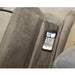 StarSleep Starise lift chair with smartphone placed on built-in wireless charging pad