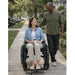 Strongback ErgoSteel wheelchair with caregiver