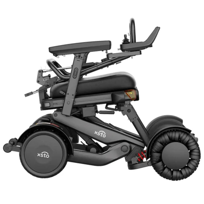 XSTO M4 Pro Smart Electric Wheelchair shown in a compact folded position from the side, highlighting its space-saving design for easy storage, transportation, and travel.