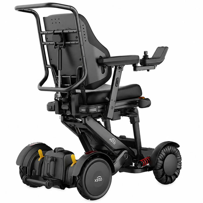 Rear three-quarter view of the XSTO M4 Pro Smart Electric Wheelchair displaying the supportive backrest, battery housing, suspension components, and compact chassis design.