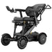 Rear three-quarter view of the XSTO M4 Pro Smart Electric Wheelchair with the backrest reclined, showing adjustable positioning, supportive seating, and rear frame structure.