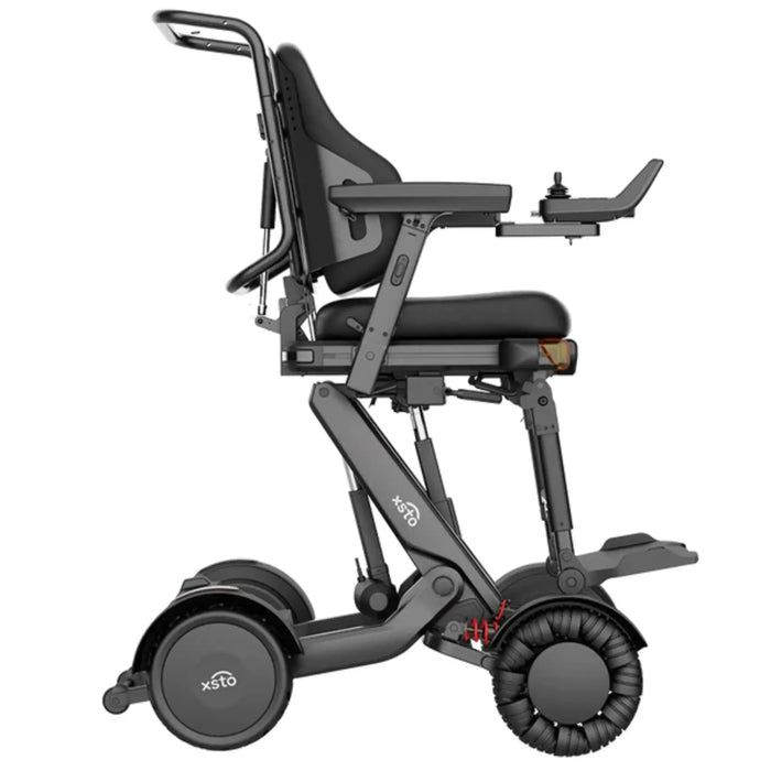 XSTO M4 Pro Smart Electric Wheelchair raised into its standing position, demonstrating powered seat elevation for improved reach, accessibility, and user interaction.